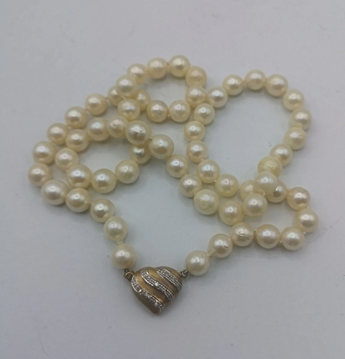 Akoya Perlencollier 7 mm mit Herz-Verschluss aus 585 Gelbgold & Diamanten – Zeitlos Elegant