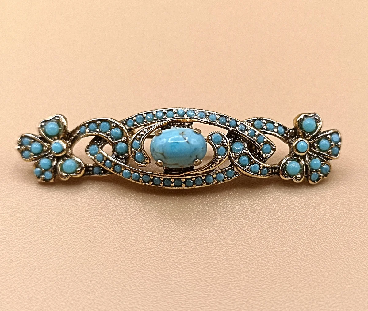 Längliche Jugendstil Türkis Brosche vergoldet um 1920