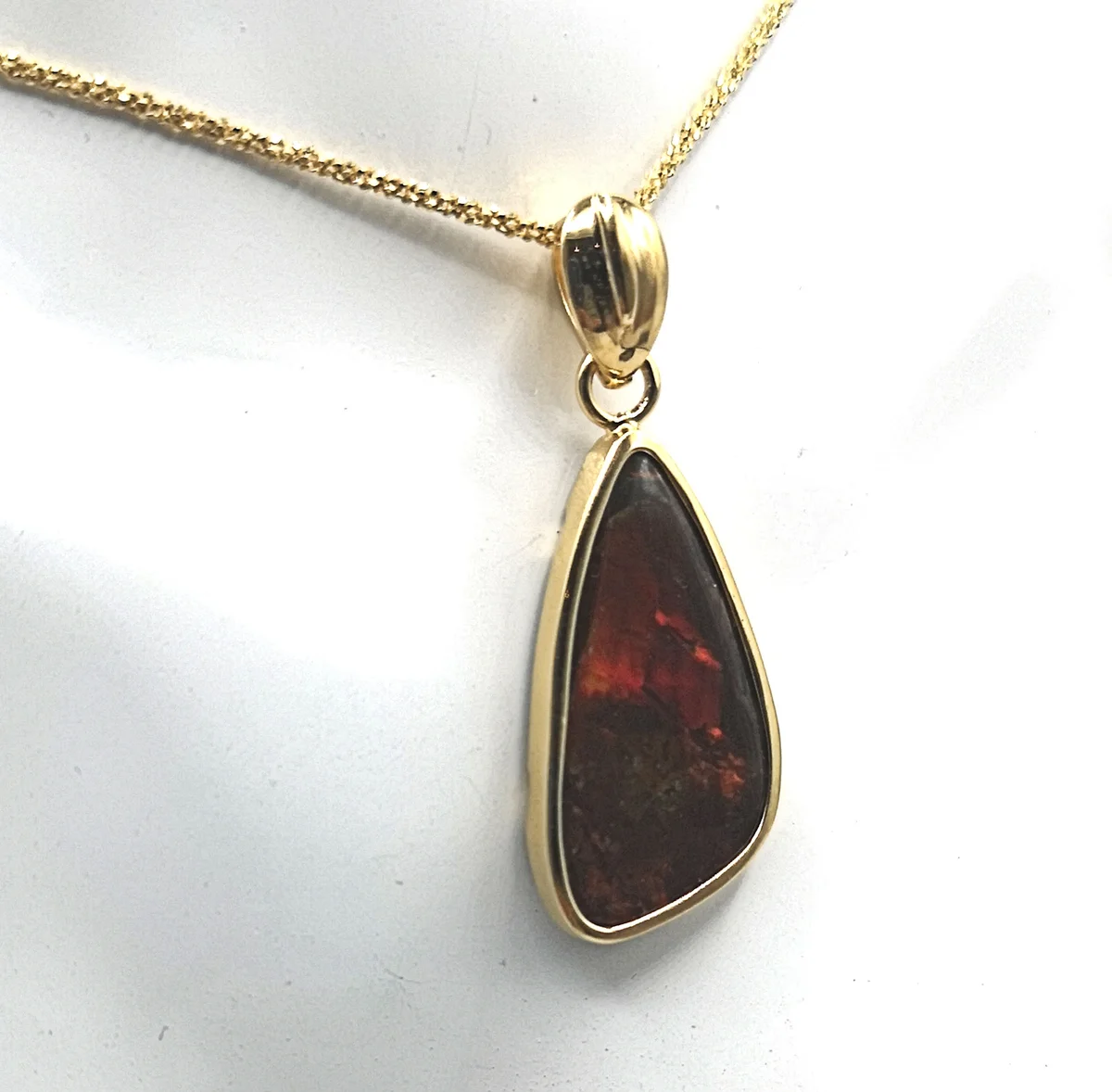 Lavarotes Ammolith Amulett gefaßt in Silber vergoldet inkl. Kette